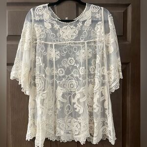 Women’s size large flowy embroidered top